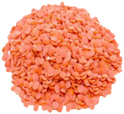 A heap of Masoor Dal: split red lentil halves.